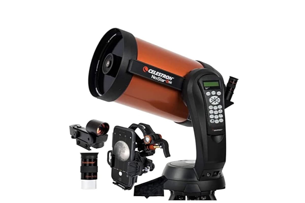Celestron NexStar 8SE telescope with orange tube, single fork mount, hand controller, and accessories displayed - complete computerized telescope setup