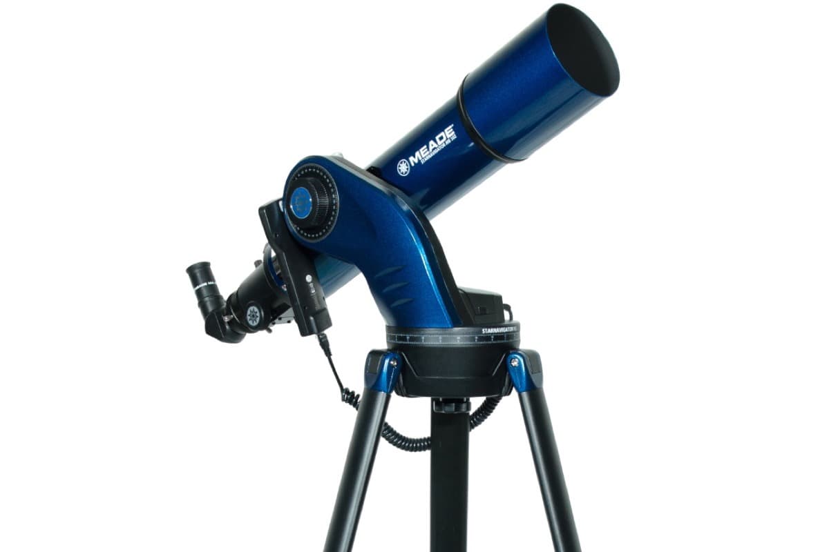 Meade ETX90 Observer telescope with distinctive blue tube and dual-arm fork mount on tripod - a classic discontinued Maksutov-Cassegrain telescope